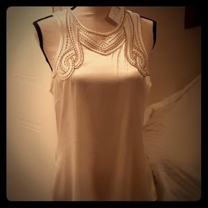 Blouse/sleaveless tank, beautiful with many Suites
